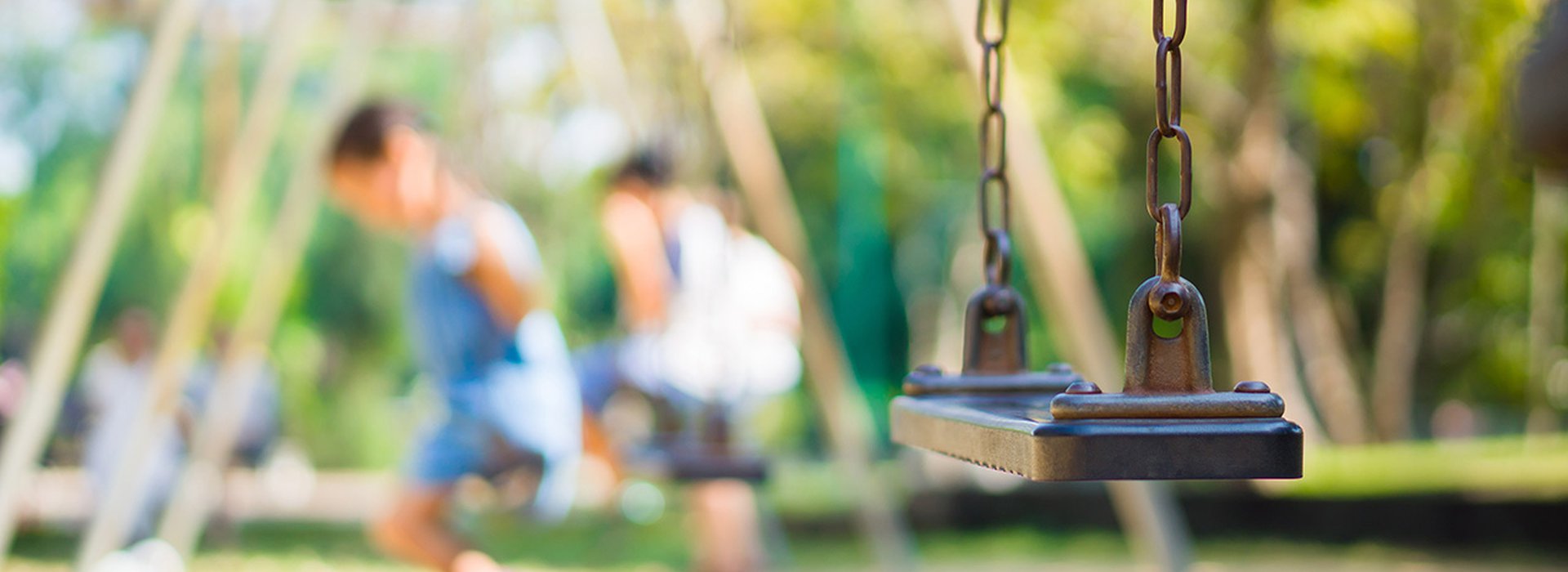 Set of chain swings on modern kids playground